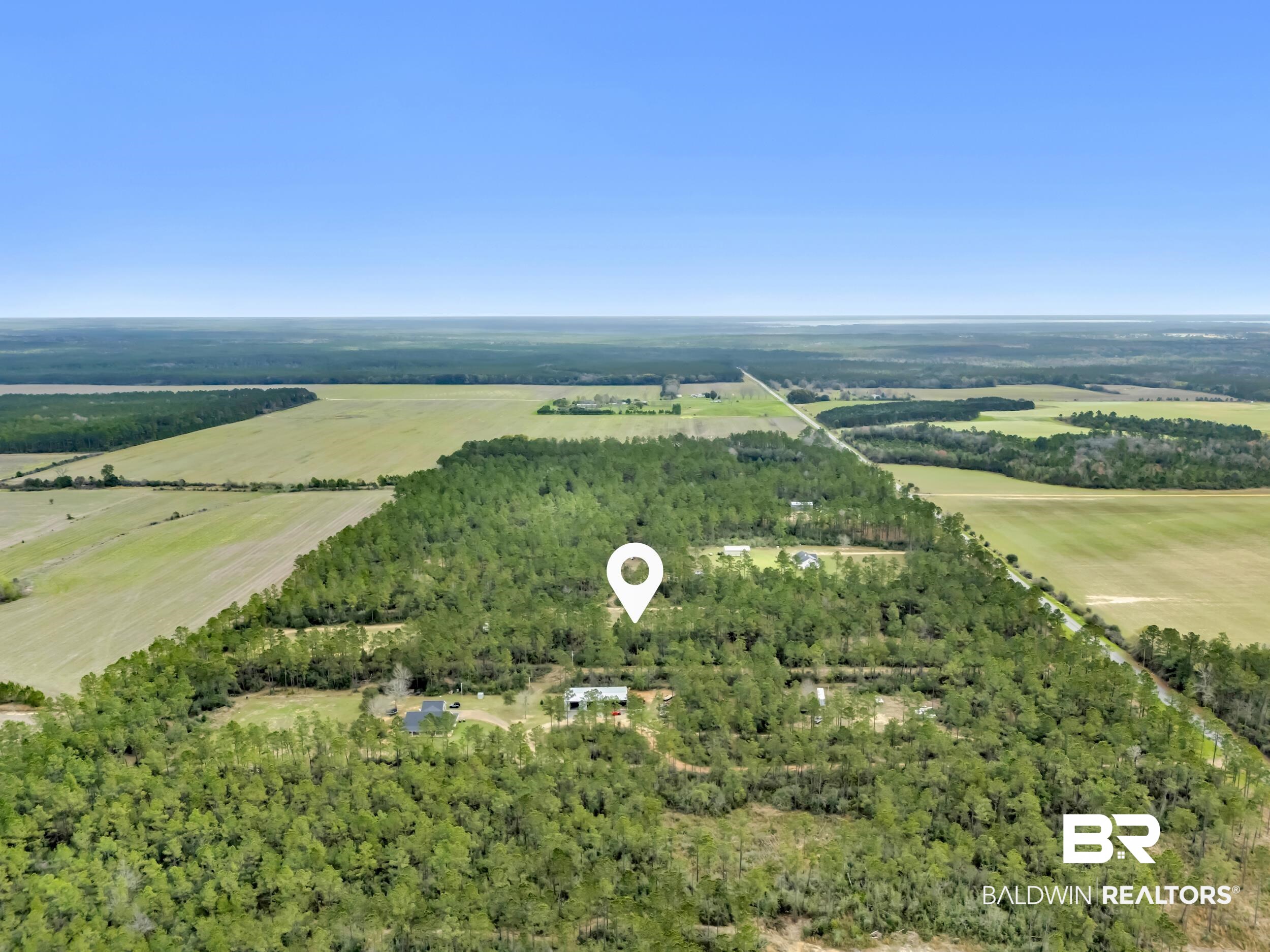 0 Gardner Road Elberta, AL 36530 - Photo 8 of 19 View of rural area featuring a heavily wooded area
