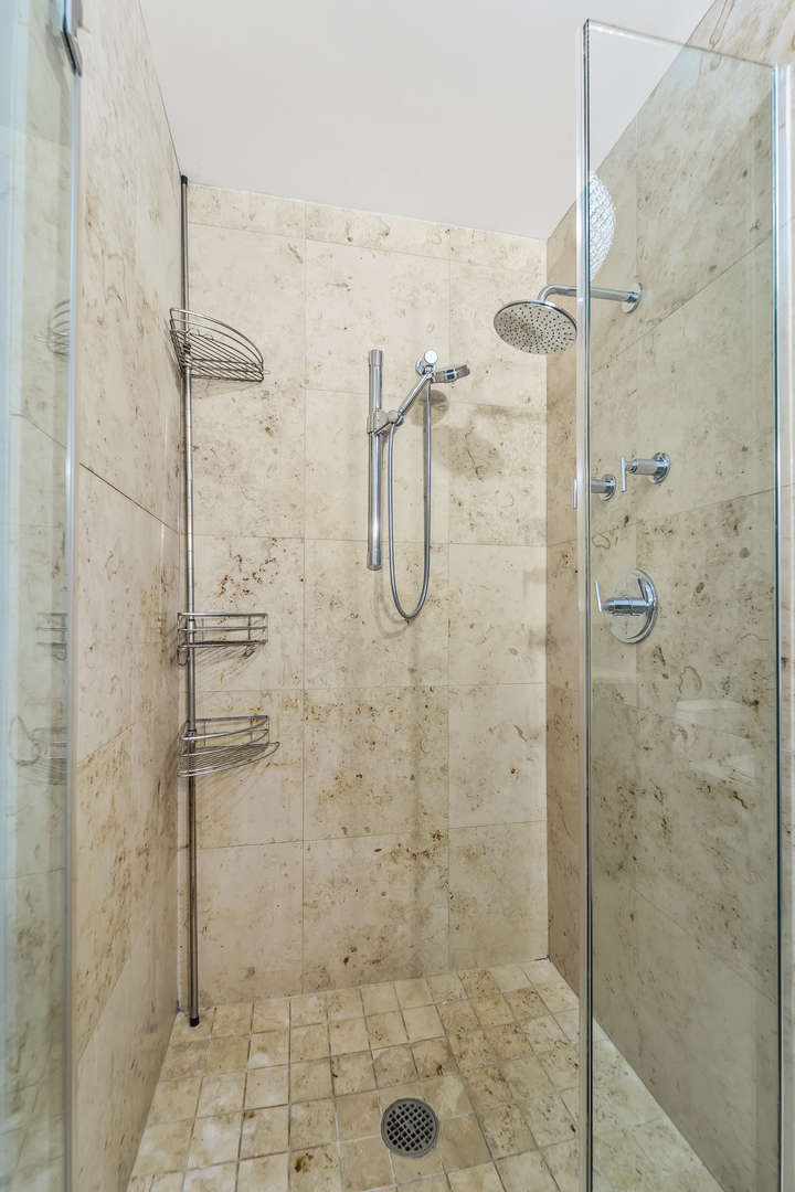 611 South Wells Street, Unit 3102 Chicago, IL 60607 - Photo 19 of 33 a bathroom with a shower