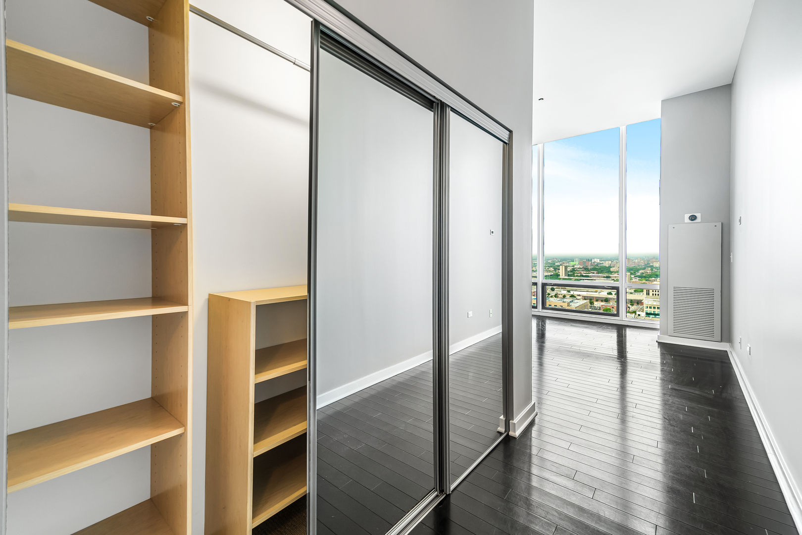 611 South Wells Street, Unit 3102 Chicago, IL 60607 - Photo 20 of 33 a view of hallway with wooden floor