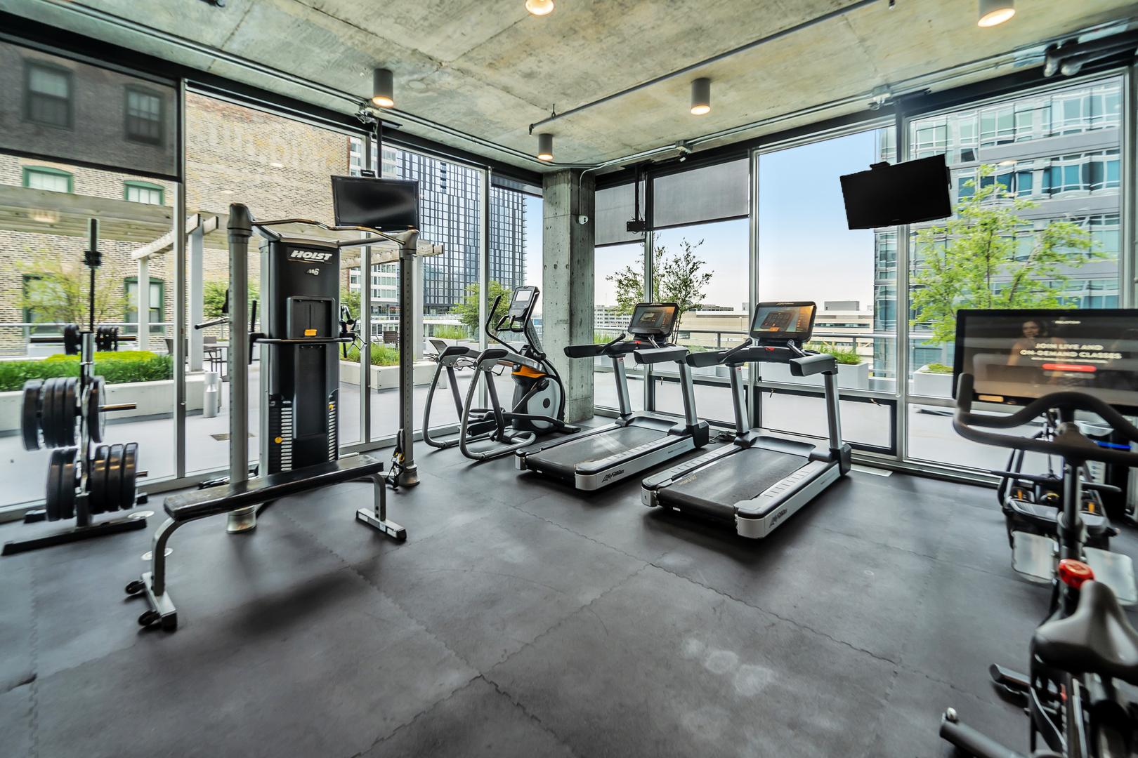 611 South Wells Street, Unit 3102 Chicago, IL 60607 - Photo 26 of 33 a view of a room with gym equipment