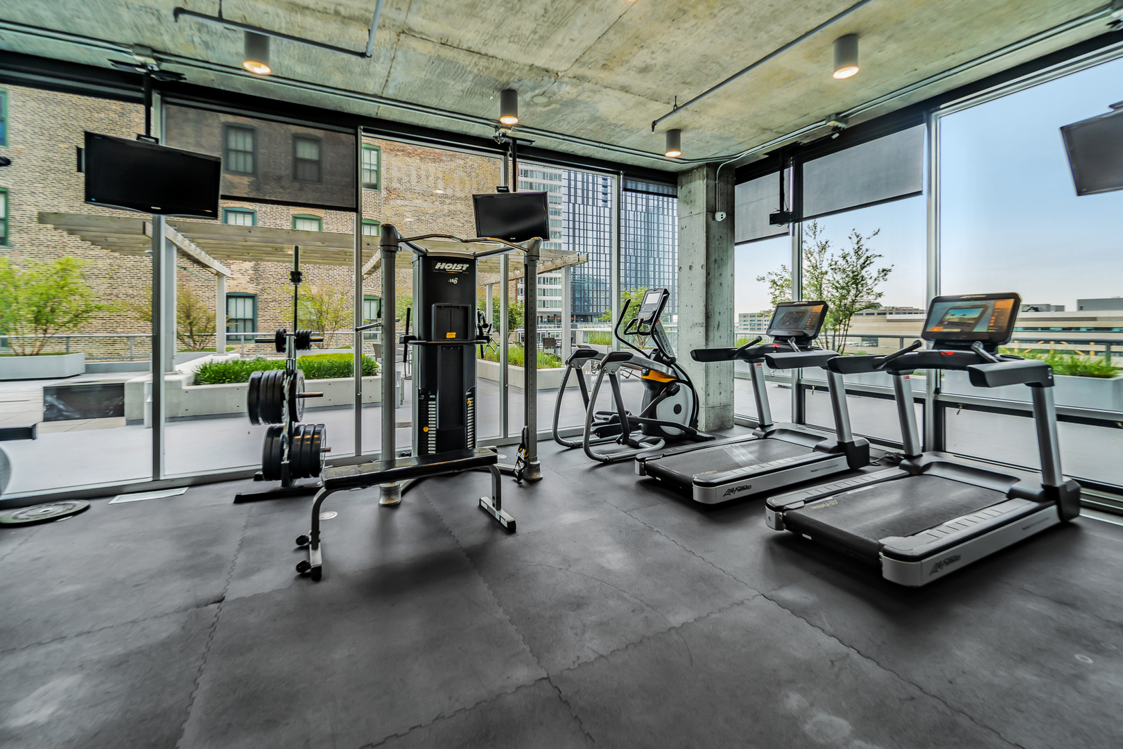 611 South Wells Street, Unit 3102 Chicago, IL 60607 - Photo 28 of 33 a view of a room with gym equipment