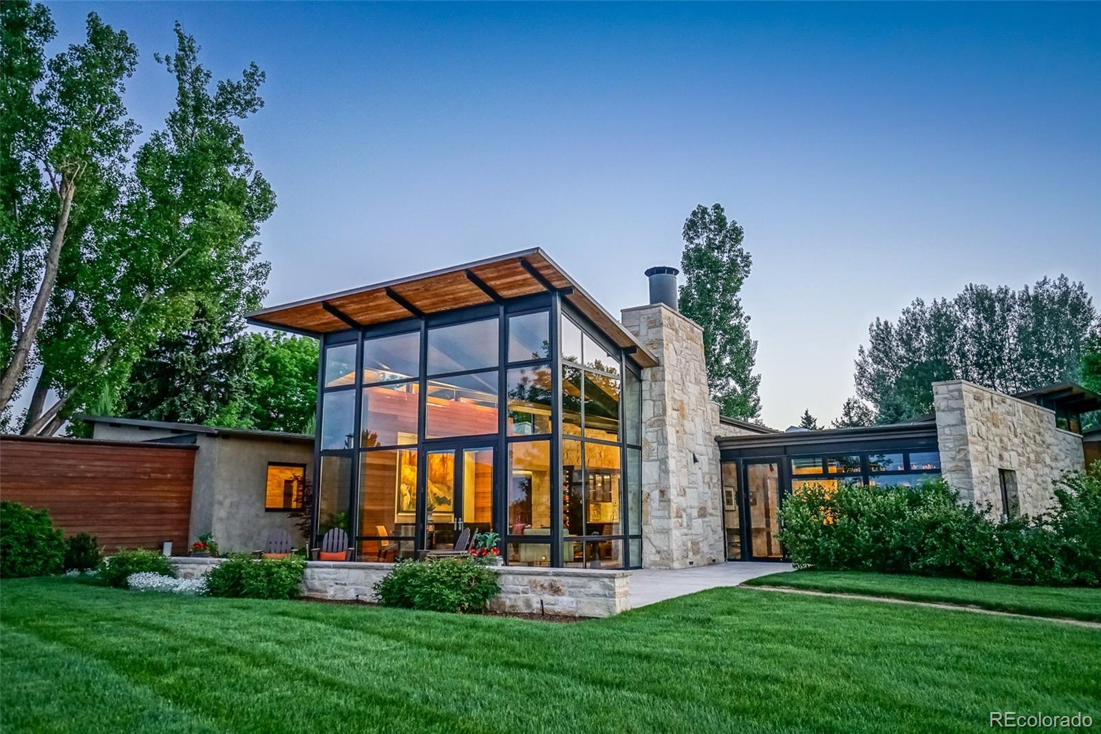 7983 Valmont Road Boulder, CO 80301 - Photo 1 of 31 a front view of house with yard and outdoor seating