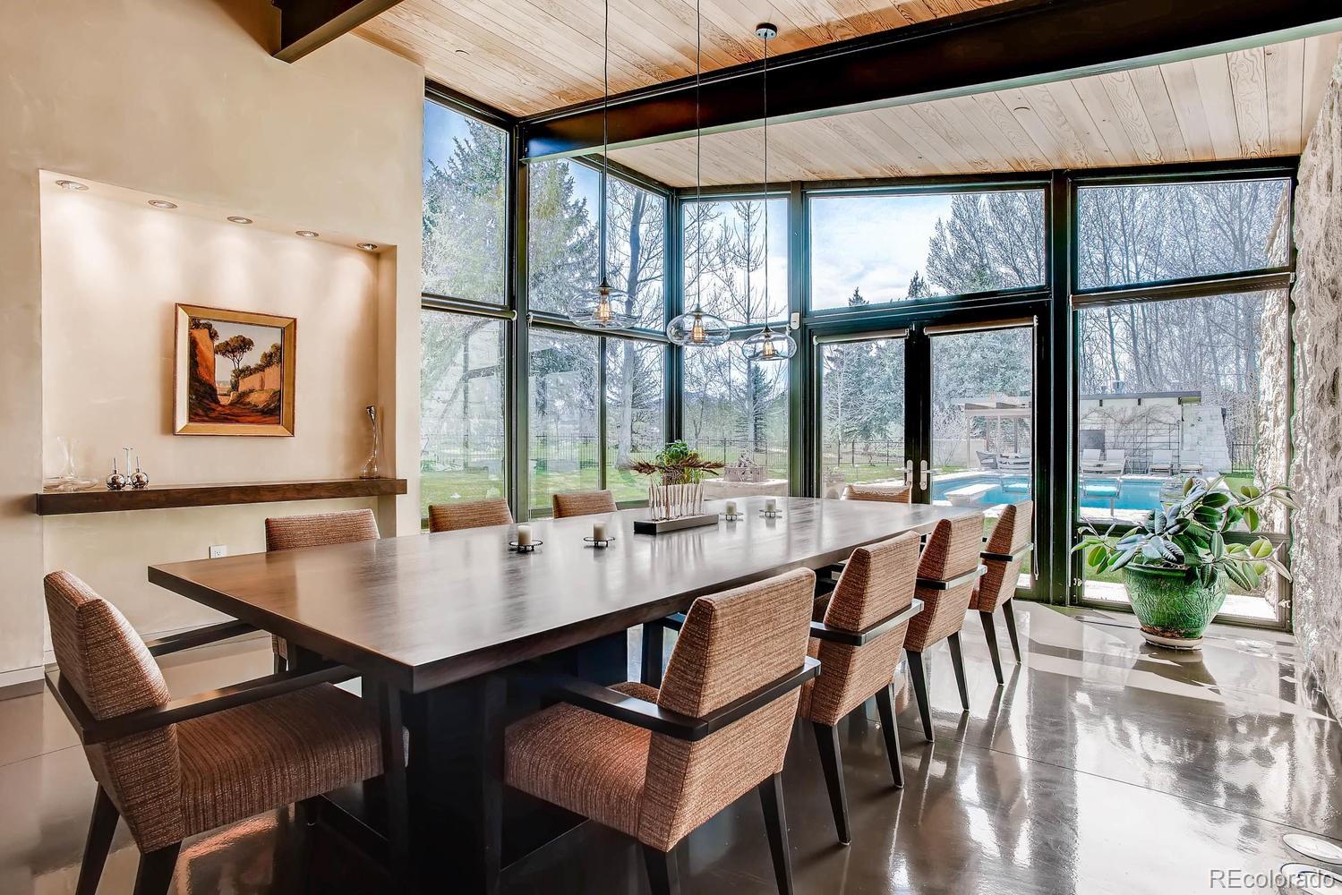 7983 Valmont Road Boulder, CO 80301 - Photo 17 of 31 a view of a dining room with furniture window and outside view