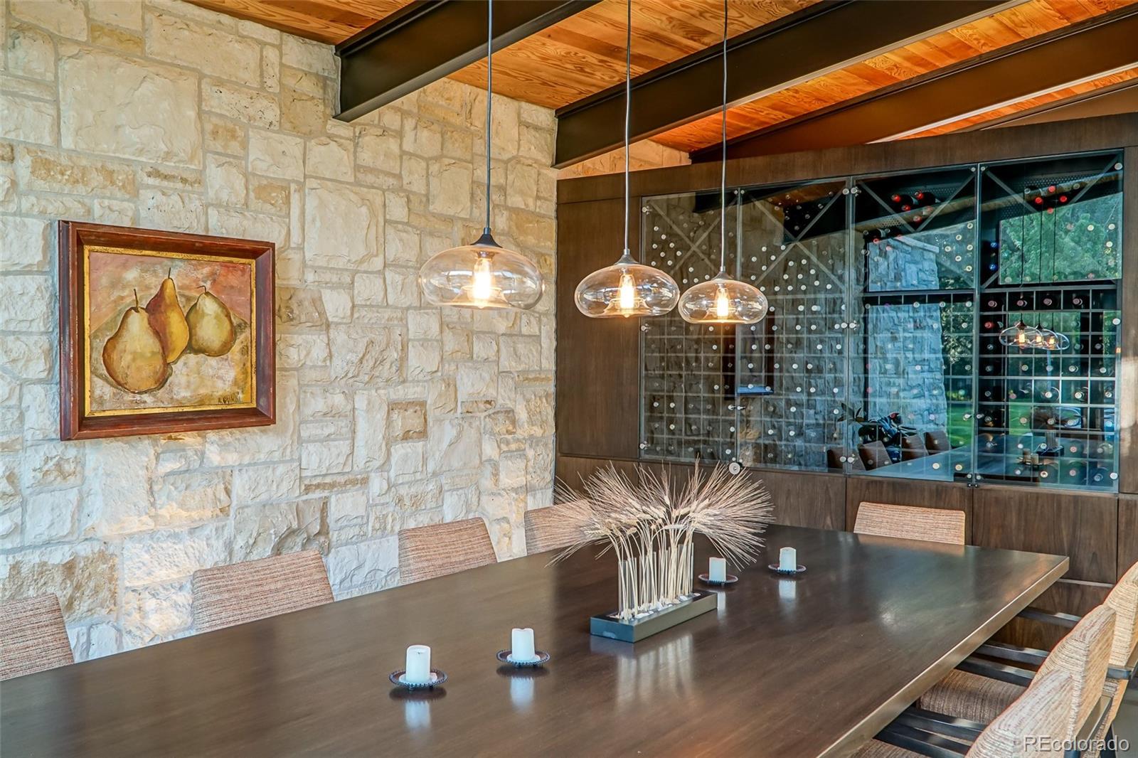 7983 Valmont Road Boulder, CO 80301 - Photo 18 of 31 a dinning table and chairs in patio of the house