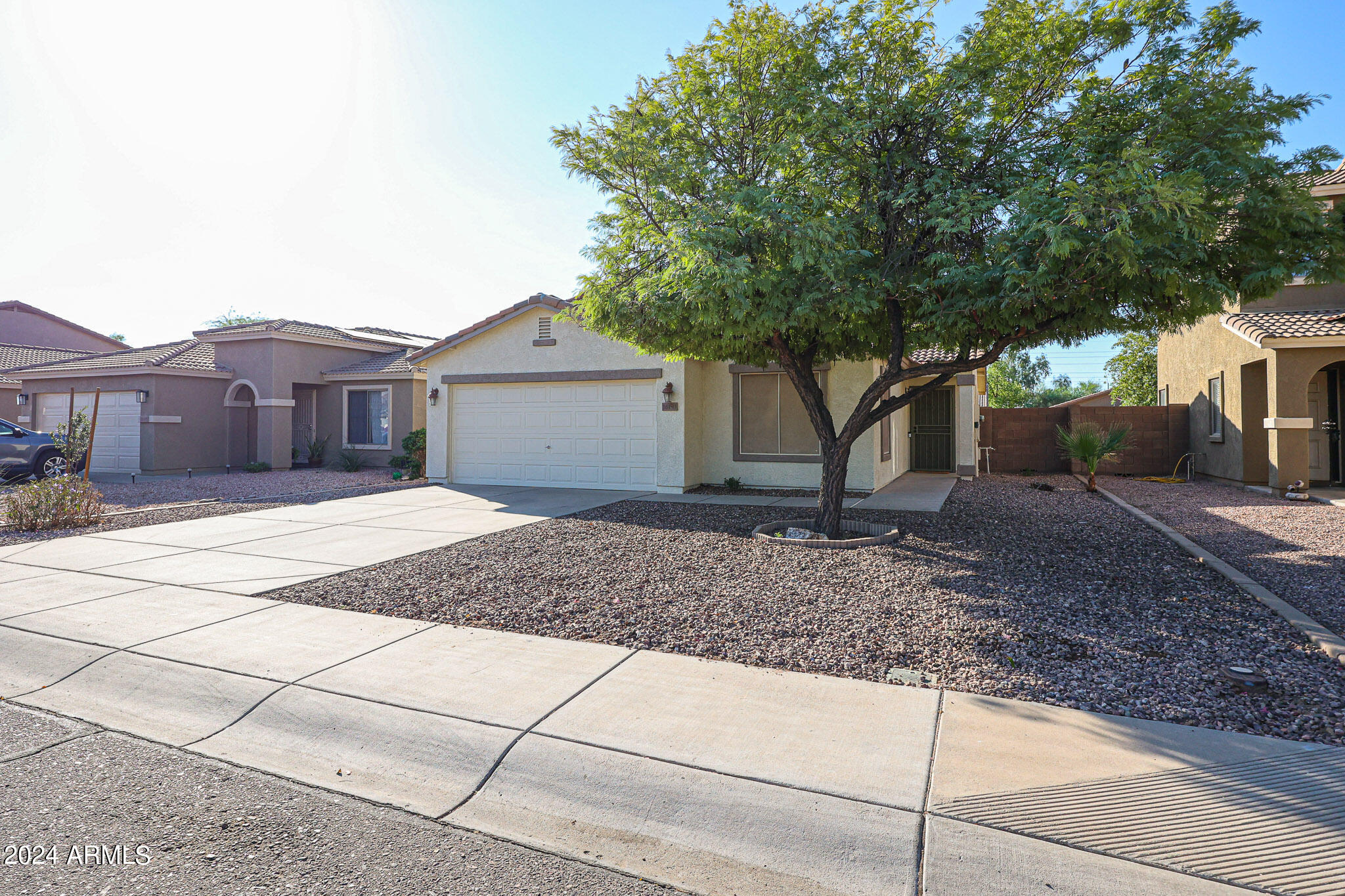 16193 West Calavar Road Surprise, AZ 85379 - Photo 3 of 43 a house view with a outdoor space