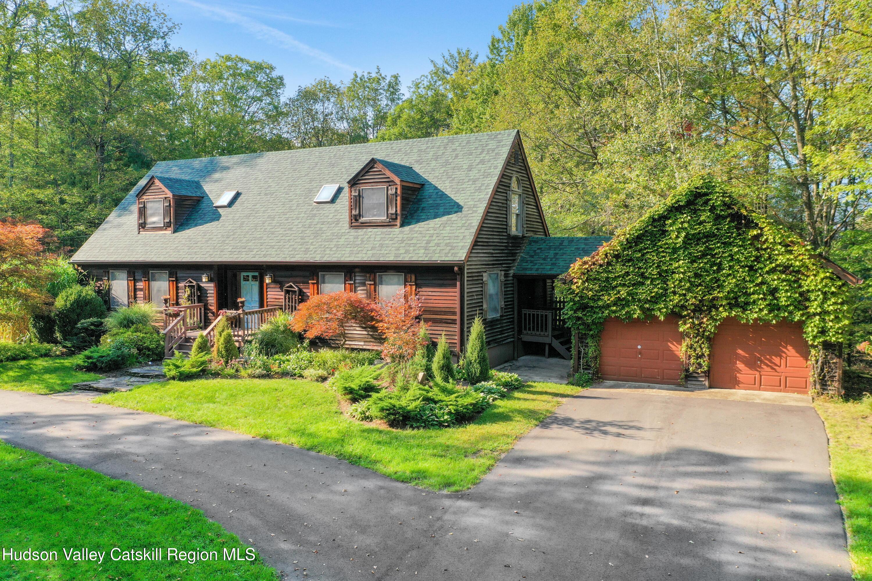 4 Mountain View Drive Kerhonkson, NY 12446 - Photo 1 of 37 a view of a house with a yard and potted plants