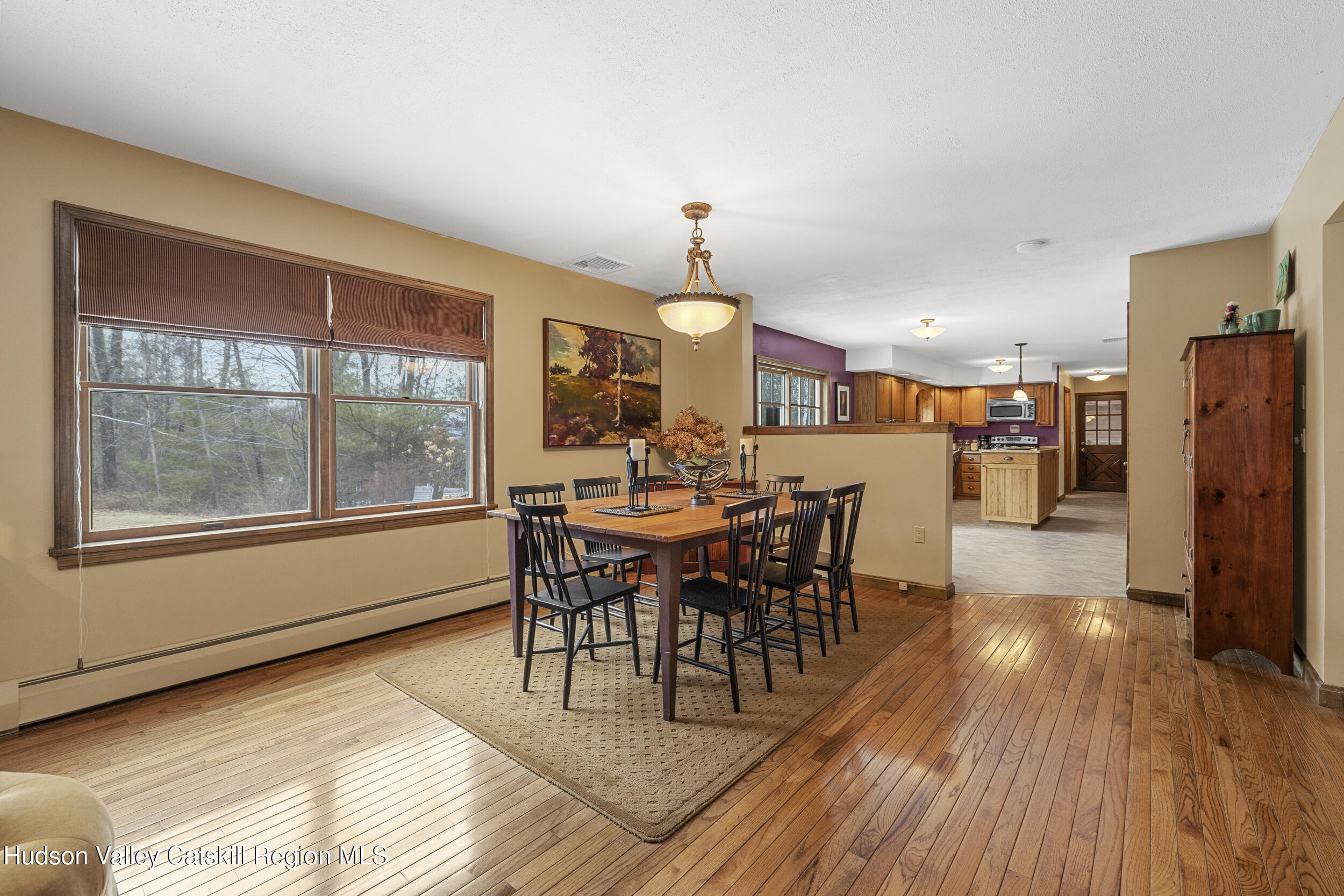 4 Mountain View Drive Kerhonkson, NY 12446 - Photo 20 of 37 a view of a dining room with furniture window and wooden floor