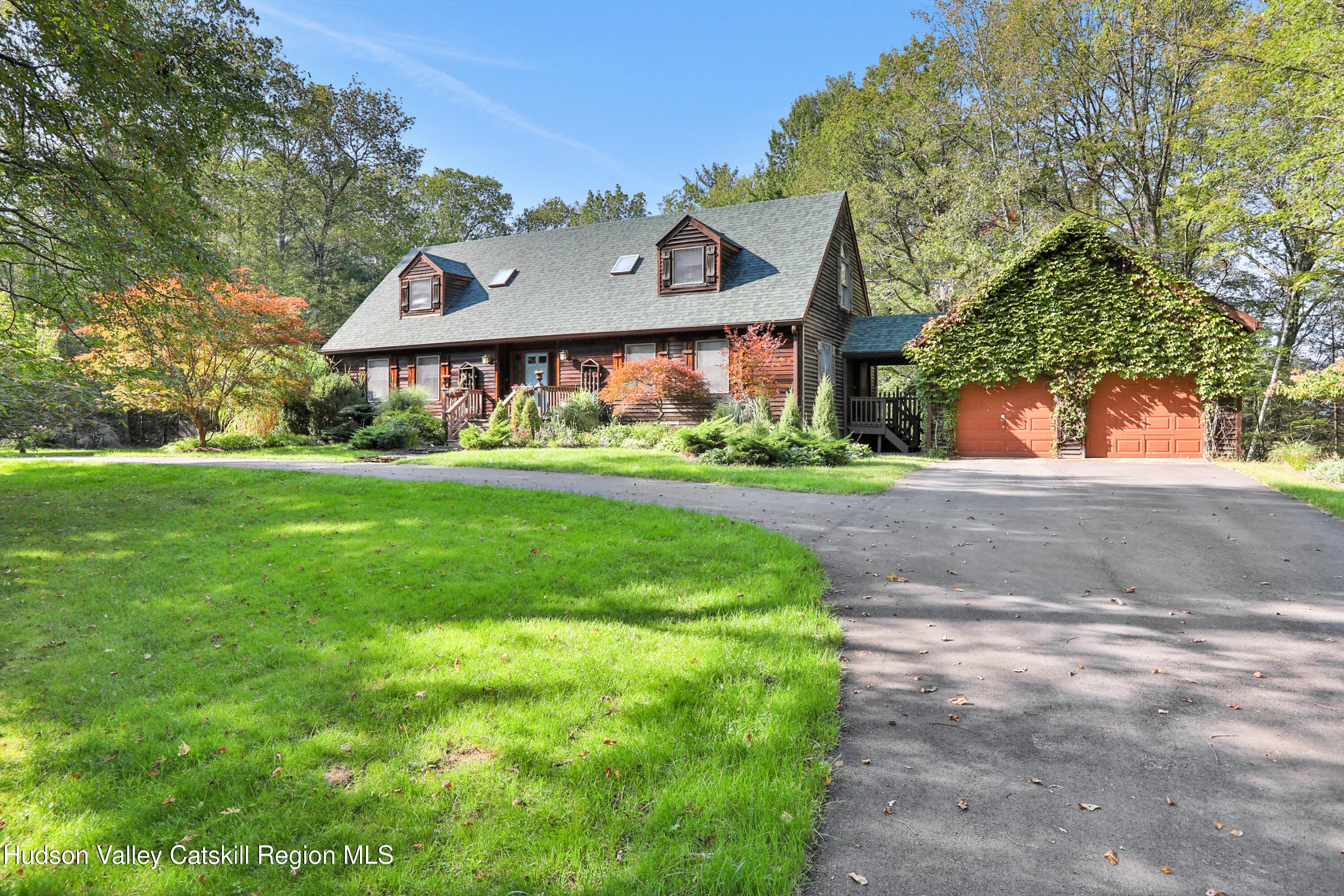 4 Mountain View Drive Kerhonkson, NY 12446 - Photo 2 of 37 a front view of a house with a yard