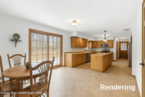 a kitchen with sink a stove and chairs