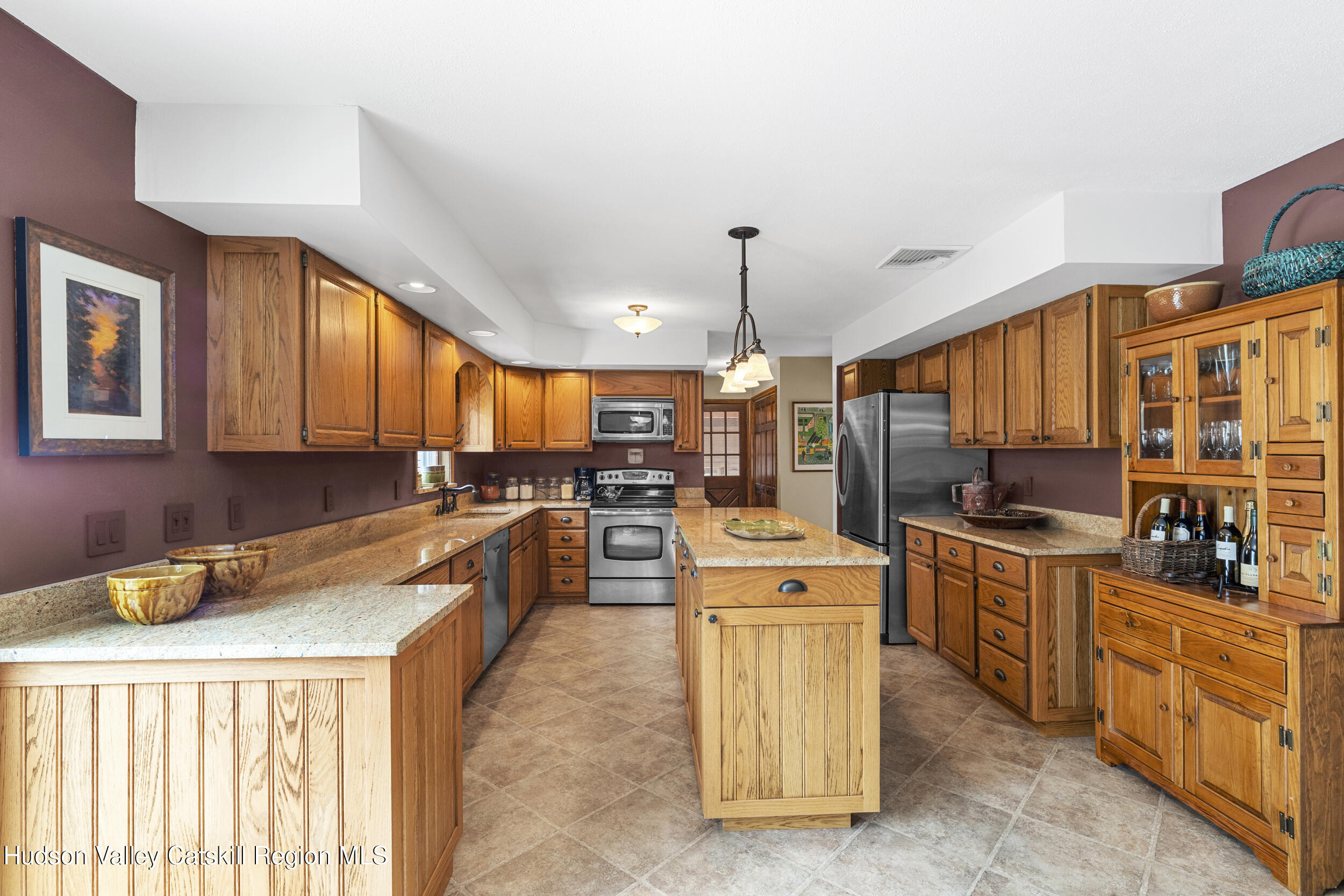 4 Mountain View Drive Kerhonkson, NY 12446 - Photo 24 of 37 a kitchen that has a lot of cabinets in it and appliances