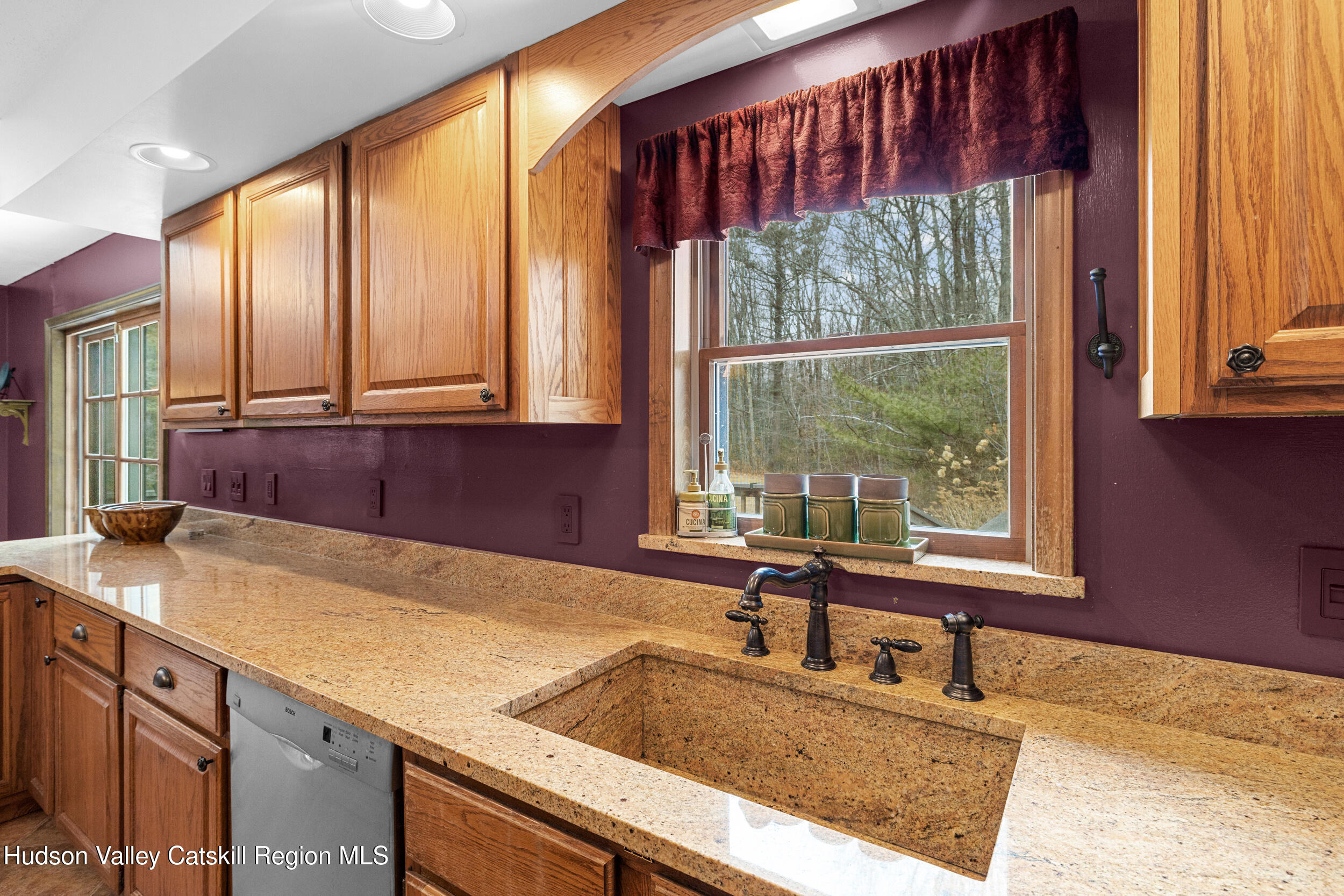 4 Mountain View Drive Kerhonkson, NY 12446 - Photo 26 of 37 a kitchen with a sink a counter top and a large window