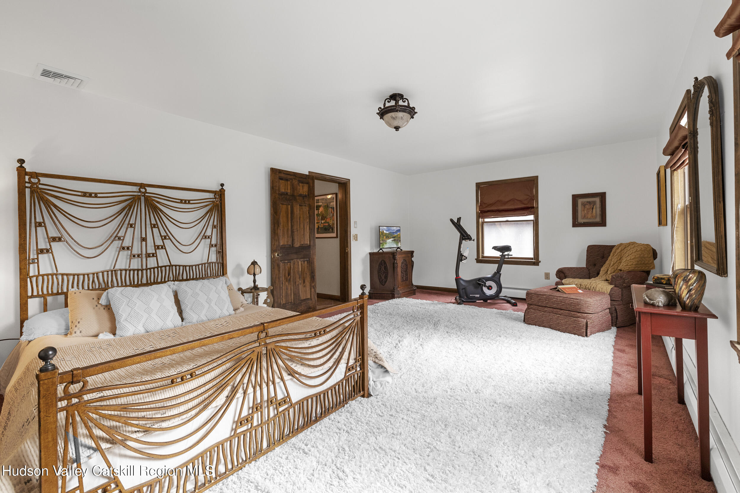 4 Mountain View Drive Kerhonkson, NY 12446 - Photo 27 of 37 a bedroom with furniture and a flat screen tv