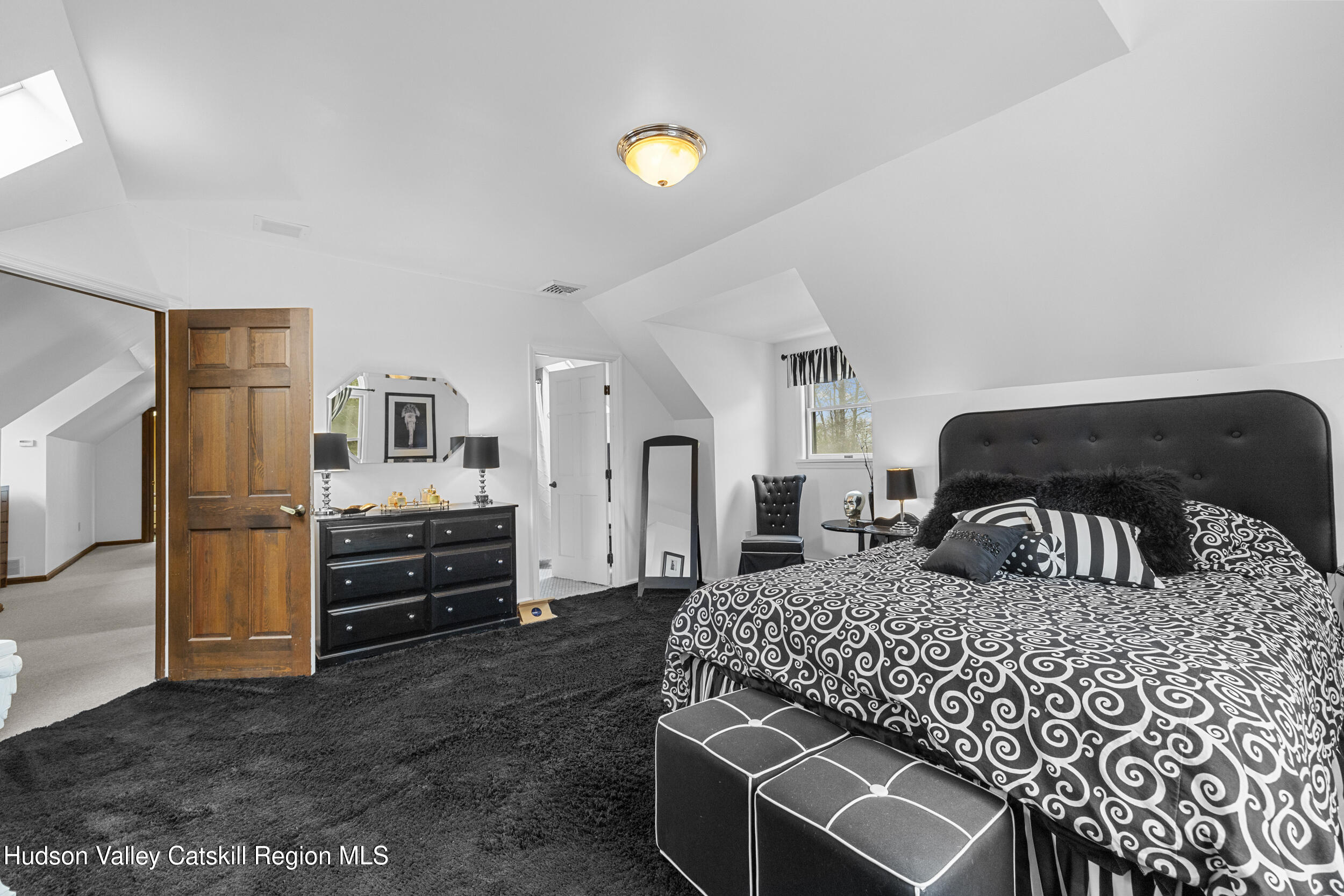 4 Mountain View Drive Kerhonkson, NY 12446 - Photo 30 of 37 a bedroom with bed and cabinets