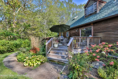 a view of a garden with patio