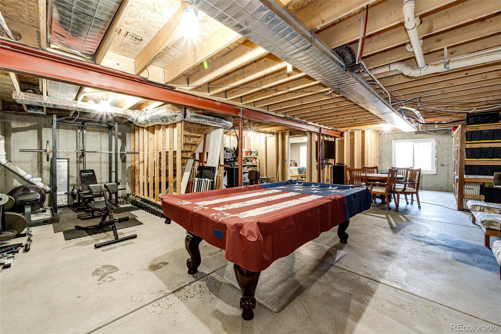 570 4th Street Bennett, CO 80102 - Photo 25 of 36 a room with pool table and chairs