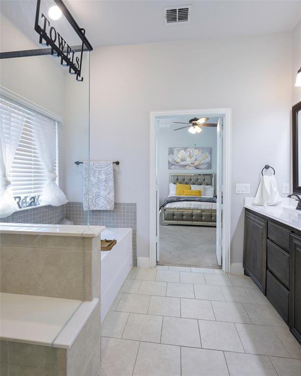 4059 Three Forks Road Kaufman, TX 75142 - Photo 13 of 25 a large white kitchen with a stove a sink and dishwasher