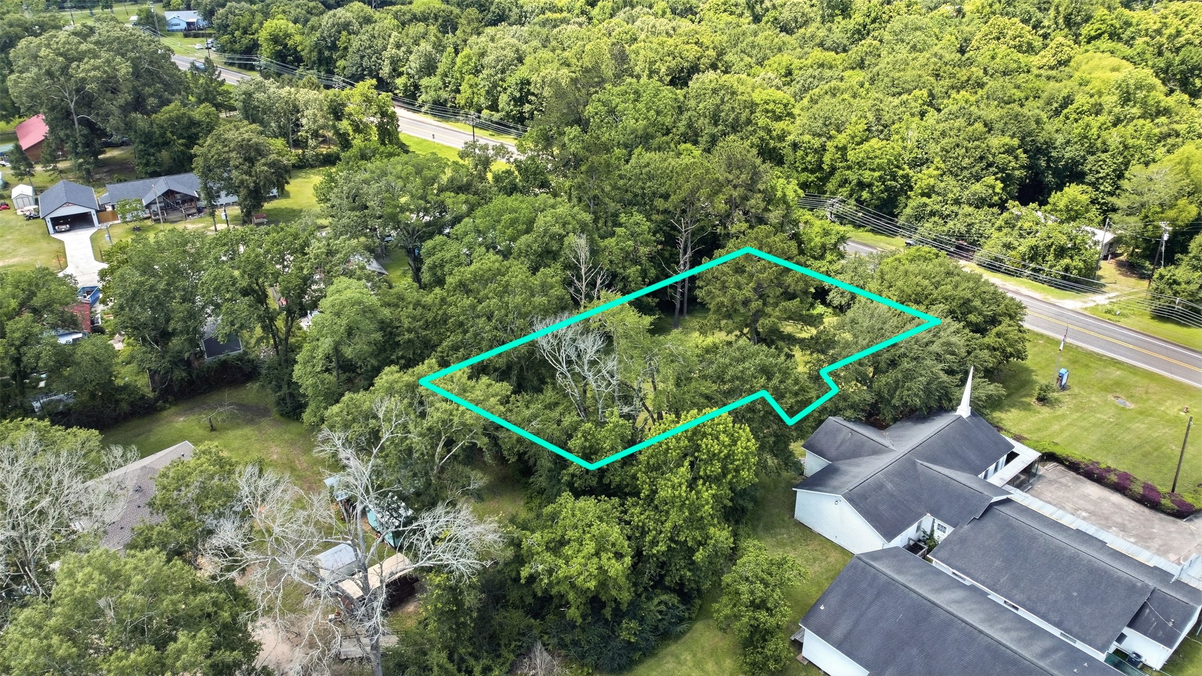 0 State Highway Loop Goodrich, TX 77335 - Photo 11 of 22 an aerial view of a house with a yard