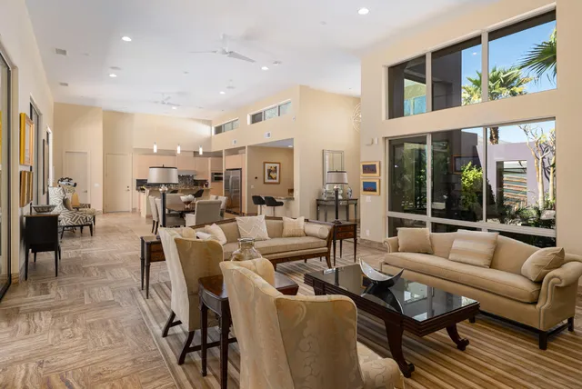 a living room with fireplace furniture and a flat screen tv