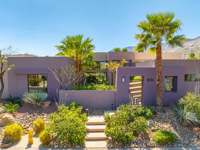 a view of a house with a street