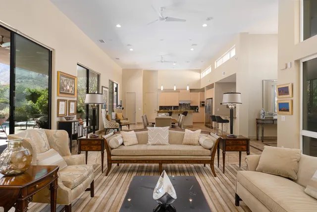 a living room with furniture or couch and a table