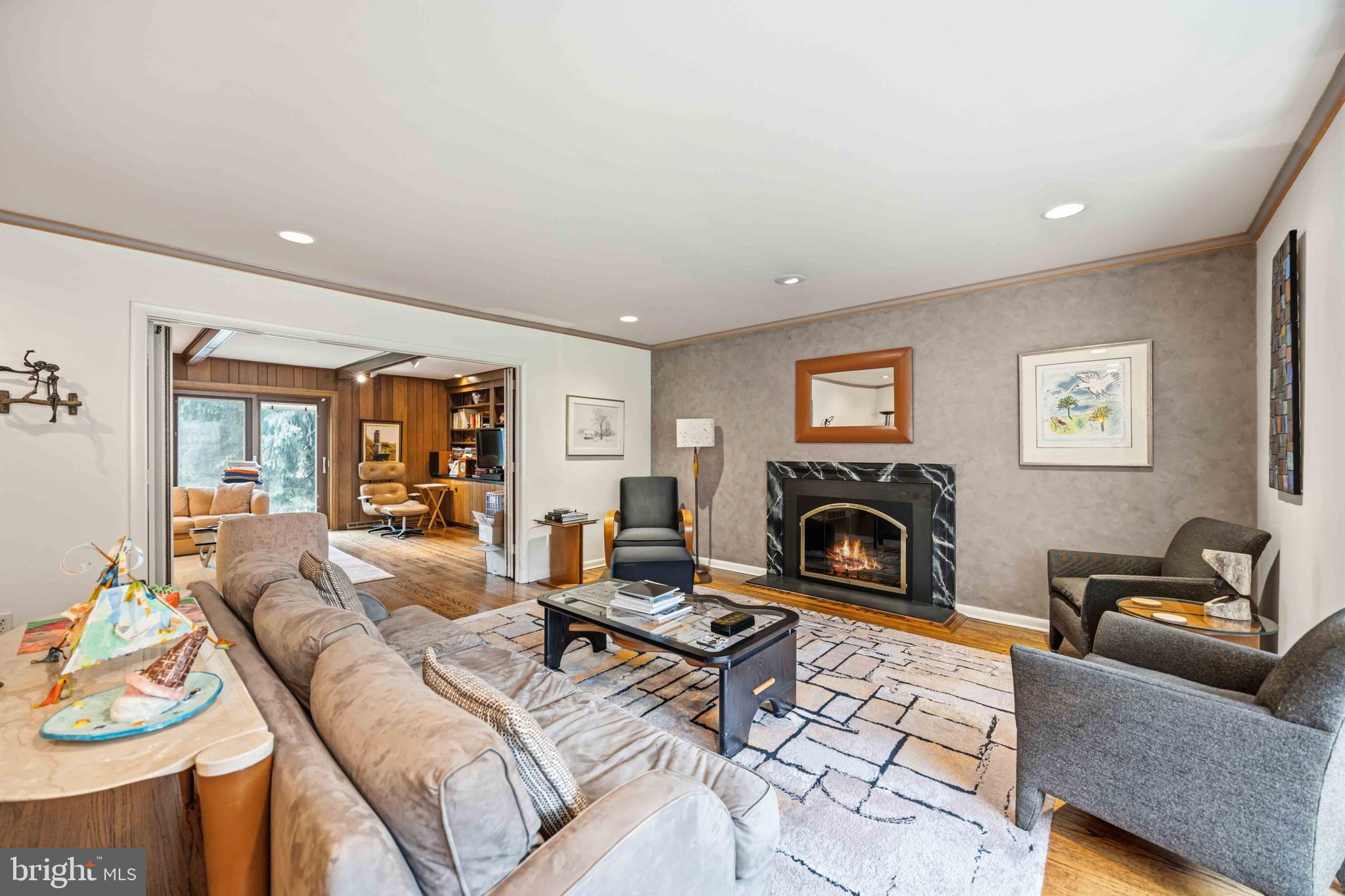 330 Bent Road Wyncote, PA 19095 - Photo 11 of 47 a living room with furniture a flat screen tv and a fireplace
