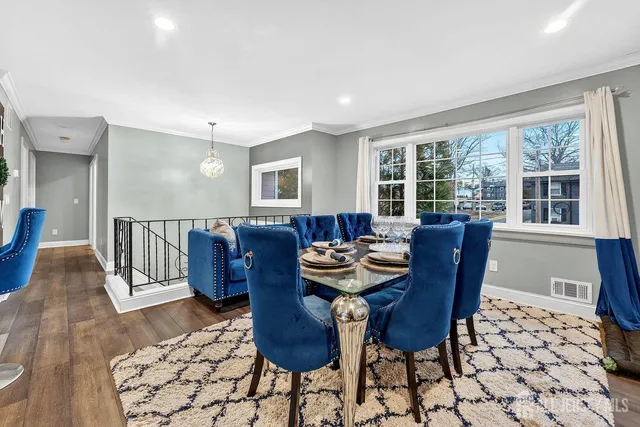 a view of a dining room with furniture