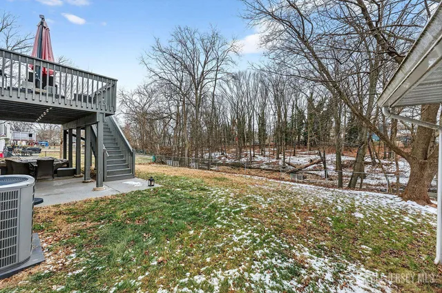 a view of a deck with a trees