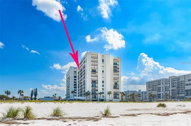 a view of a building with a swimming pool