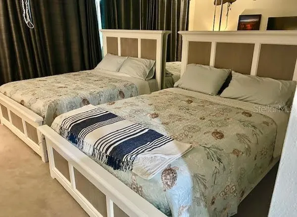 a view of a room with a large window