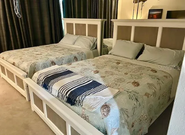 a view of a room with a large window