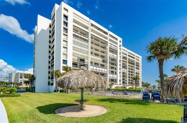 a view of a hallway with washer and dryer