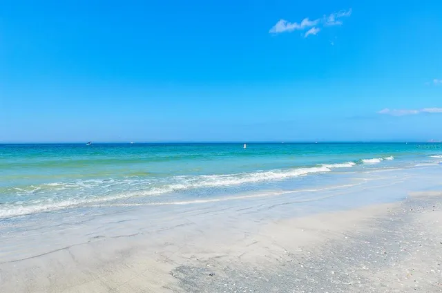 a view of swimming pool with outdoor seating