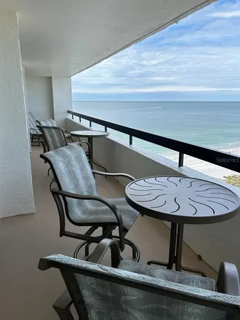 a kitchen with stainless steel appliances granite countertop sink stove and cabinets