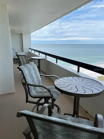 a kitchen with stainless steel appliances granite countertop sink stove and cabinets