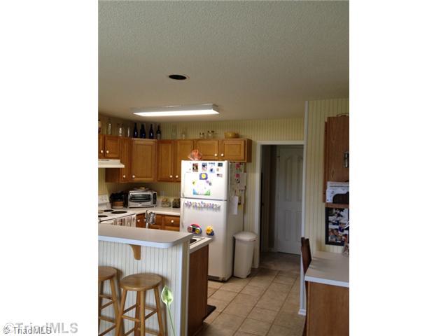 8994 Pepper Ridge Court Oak Ridge, NC 27310 - Photo 5 of 10 Kitchen.