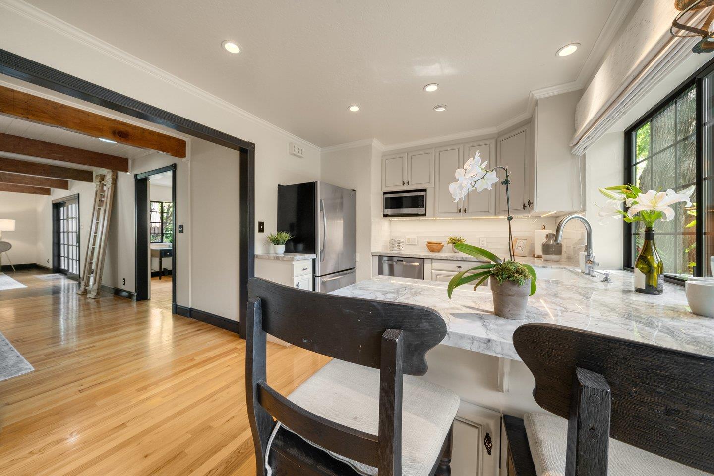 680 Cambrian Drive Campbell, CA 95008 - Photo 16 of 62 a dining room with furniture and wooden floor