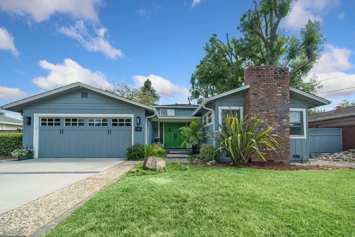 680 Cambrian Drive Campbell, CA 95008 - Photo 2 of 62 a front view of a house with a garden and plants