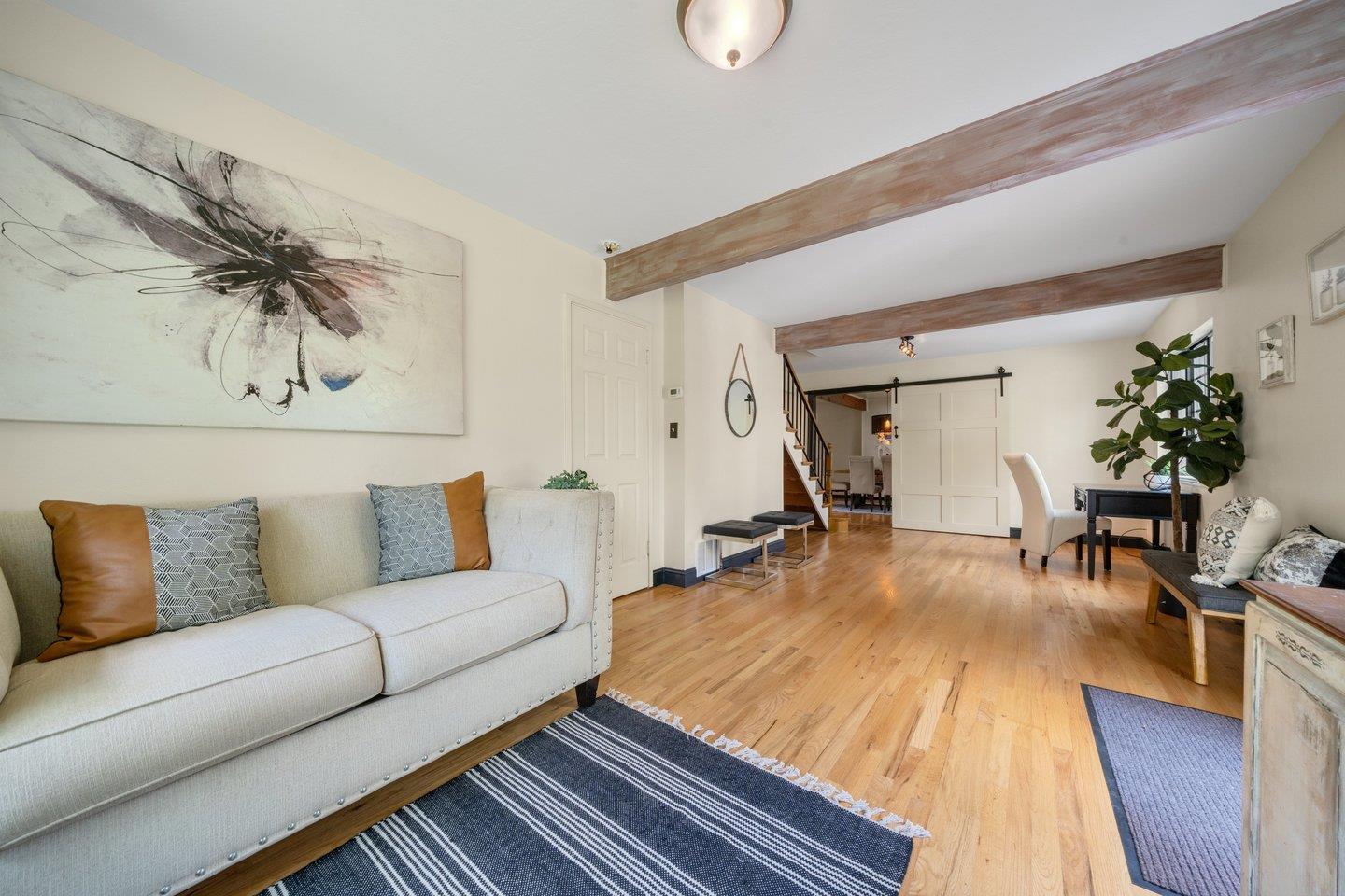 680 Cambrian Drive Campbell, CA 95008 - Photo 22 of 62 a living room with furniture and wooden floor