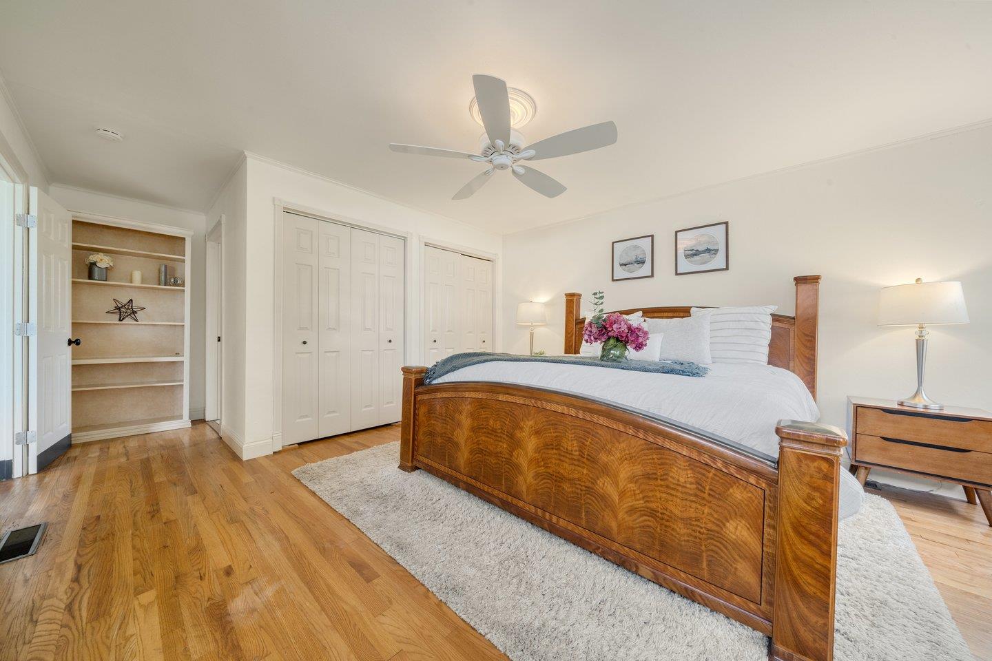 680 Cambrian Drive Campbell, CA 95008 - Photo 24 of 62 a spacious bedroom with a bed and a cabinets