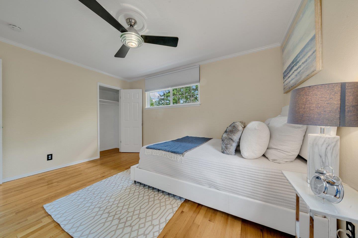 680 Cambrian Drive Campbell, CA 95008 - Photo 31 of 62 a bedroom with a bed and a night stand