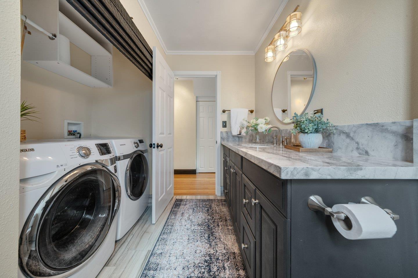 680 Cambrian Drive Campbell, CA 95008 - Photo 32 of 62 a bathroom with a granite countertop sink and a mirror