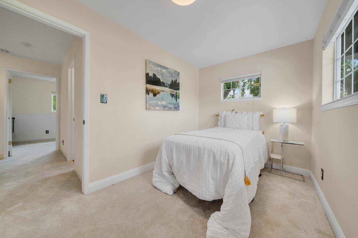 680 Cambrian Drive Campbell, CA 95008 - Photo 34 of 62 a bedroom with a bed and painting on the wall