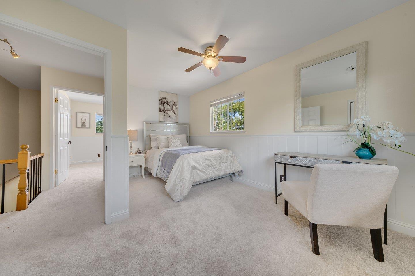 680 Cambrian Drive Campbell, CA 95008 - Photo 38 of 62 a bedroom with a bed and a chandelier