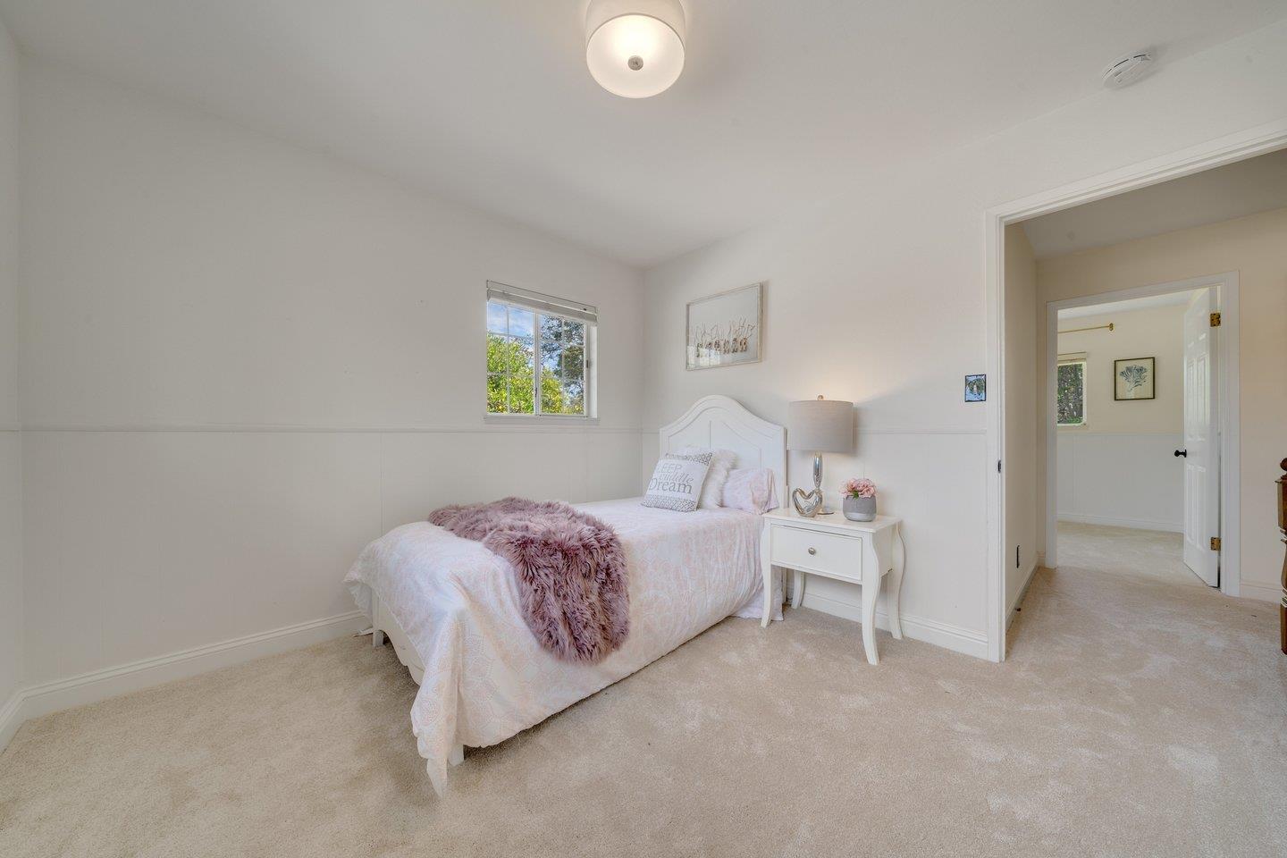 680 Cambrian Drive Campbell, CA 95008 - Photo 40 of 62 a spacious bedroom with a bed and painting on the wall