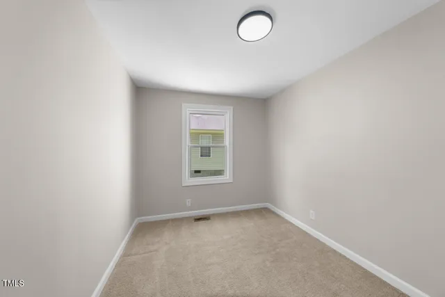 an empty room with a window