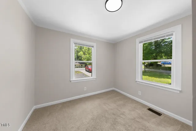 an empty room with windows