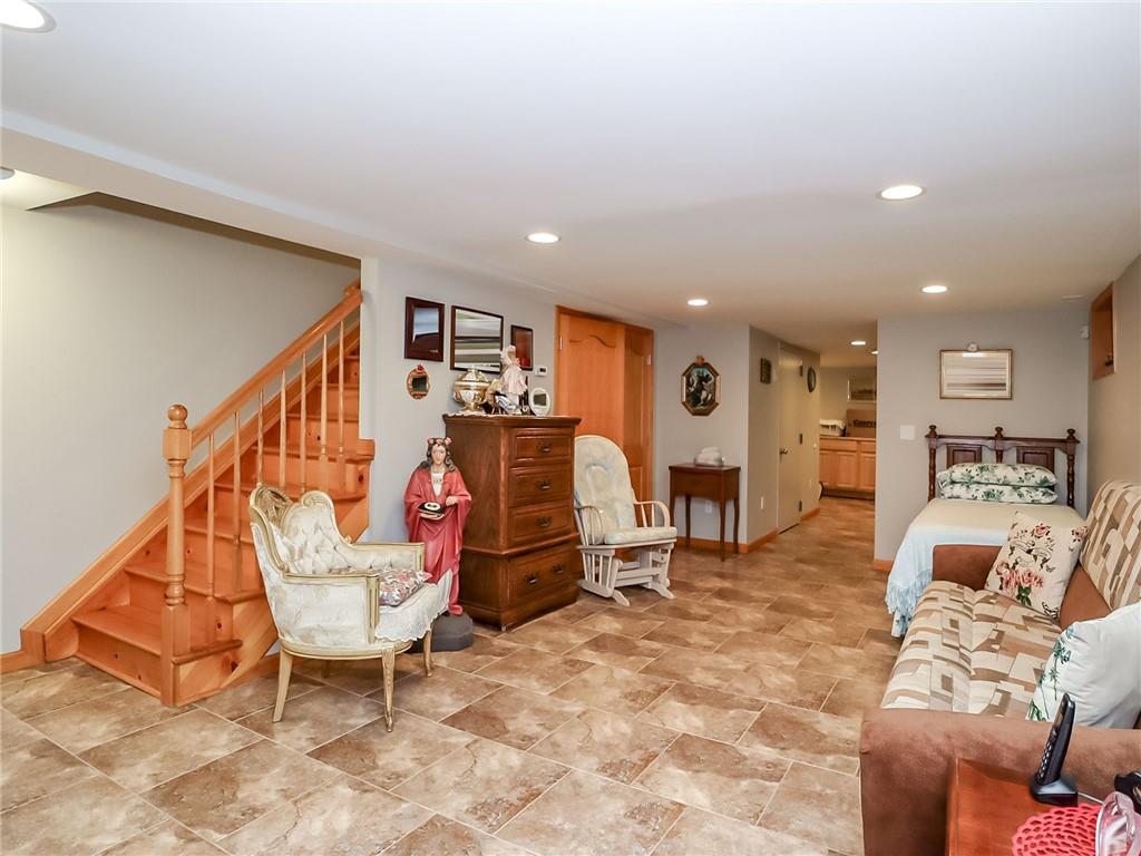 480 Van Sicklen Street Brooklyn, NY 11223 - Photo 13 of 31 a living room with furniture a dining table and chairs