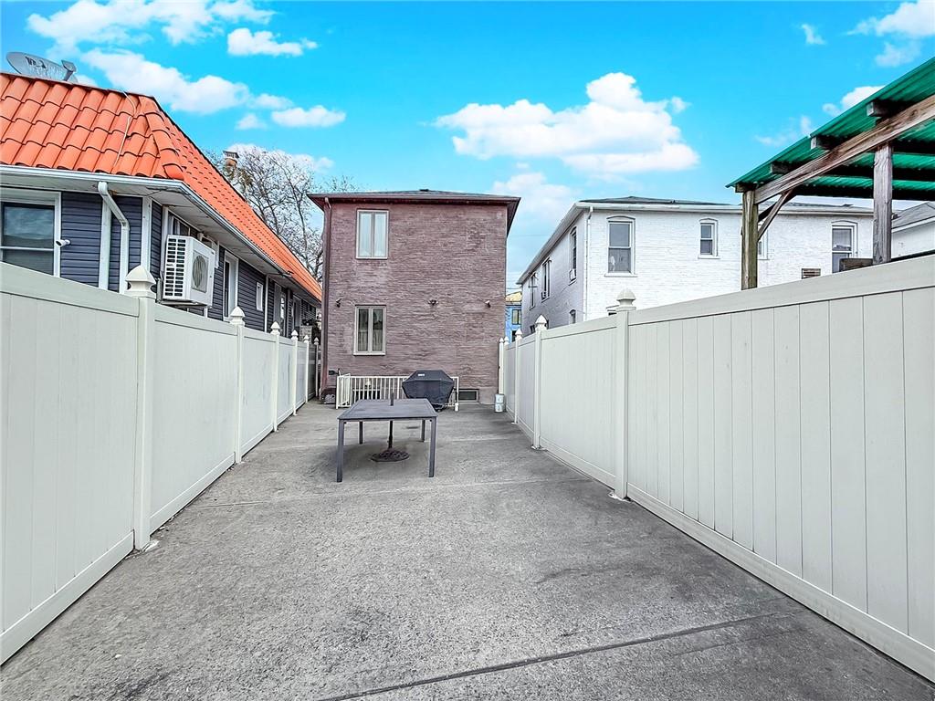 480 Van Sicklen Street Brooklyn, NY 11223 - Photo 26 of 31 a view of a house with backyard and sitting area
