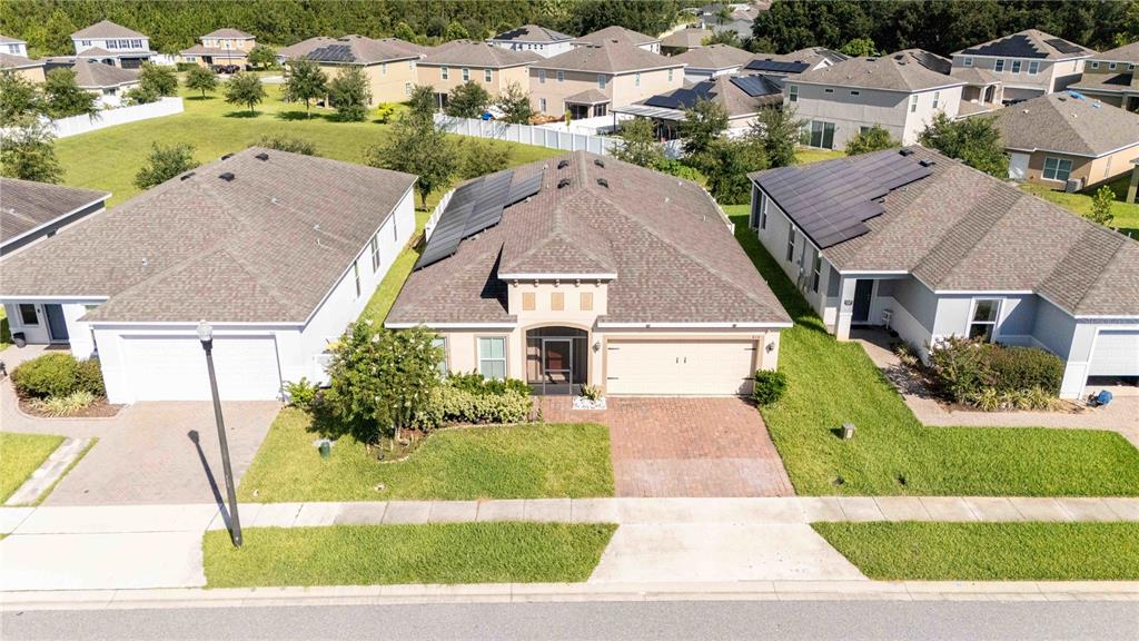 815 Montgomery Drive Davenport, FL 33897 - Photo 2 of 24 an aerial view of a house