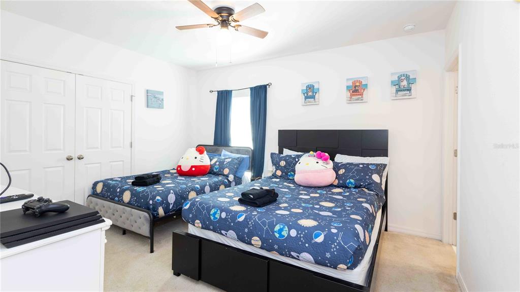 815 Montgomery Drive Davenport, FL 33897 - Photo 10 of 24 a living room with furniture and a couch